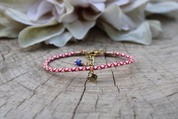 Greek March Bracelet: Evil Eye Cord bracelet, Red and White String. Sparrow charm.