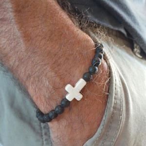 Beaded cross bracelet for men. Beaded lava rock bracelet with howlite stone cross .  Sideways cross bracelet. Howlite and lava.