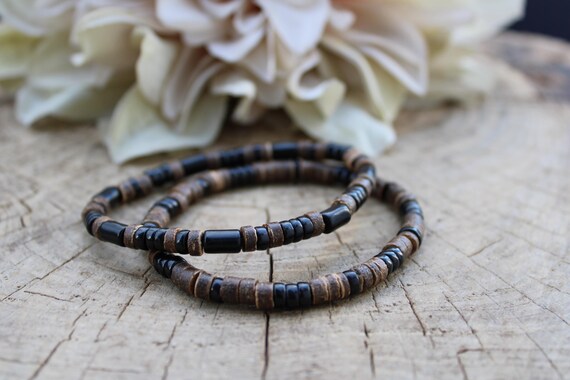 Mens beaded stretch bracelet. Mens surfer style bracelet. Mens coconut and black stone heishi bracelet.