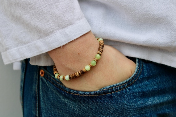Green jade bracelet.  Bracelet for good luck and prosperity. Coconut heishi and jade bracelet.  Stretch bracelet.