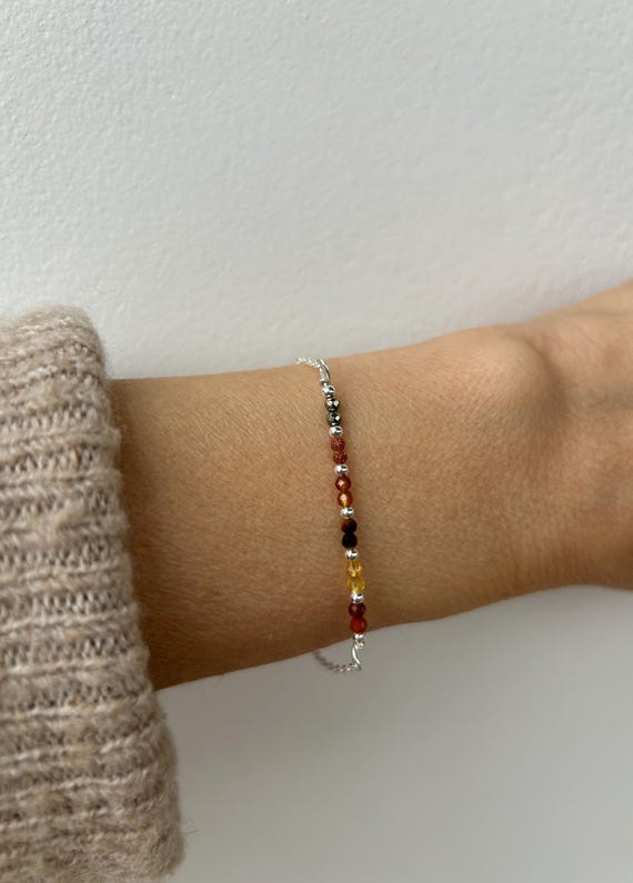 Bracelet for abundance and  positivity. Gold stone, pyrite, garnet,citrine, red jasper. Gold filled, sterling, stainless steel