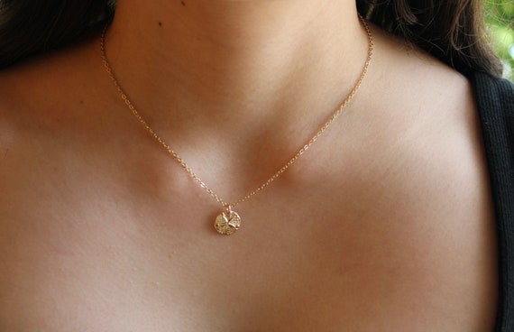 Gold sand dollar necklace. Gold filled sand dollar chain necklace. Ocean charm, Beach themed jewelry. Layering necklace.