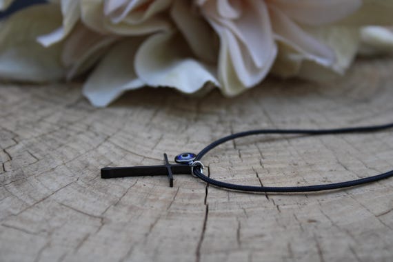 Mens stainless steel cross and evil eye cord necklace. Black stainless steel cross pendant necklace.  Cord necklace with cross and evil eye.