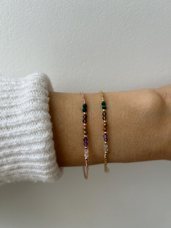 Emotional balance/self love. Dispel  negativity. Malachite, smoky quartz, unakite, amethyst, rose quartz.  Gold filled/sterling silver