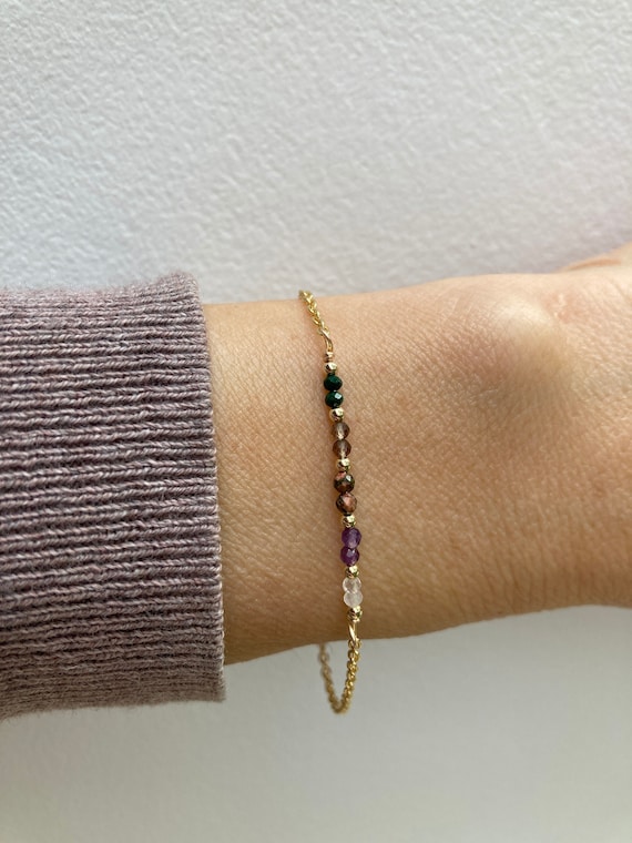 Emotional balance/self love. Dispel  negativity. Malachite, smoky quartz, unakite, amethyst, rose quartz.  Gold filled/sterling silver