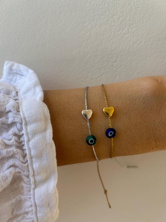 Evil eye cord bracelet.  Evil eye and puffy heart string bracelet. Adjustable cord bracelet with Greek mati.