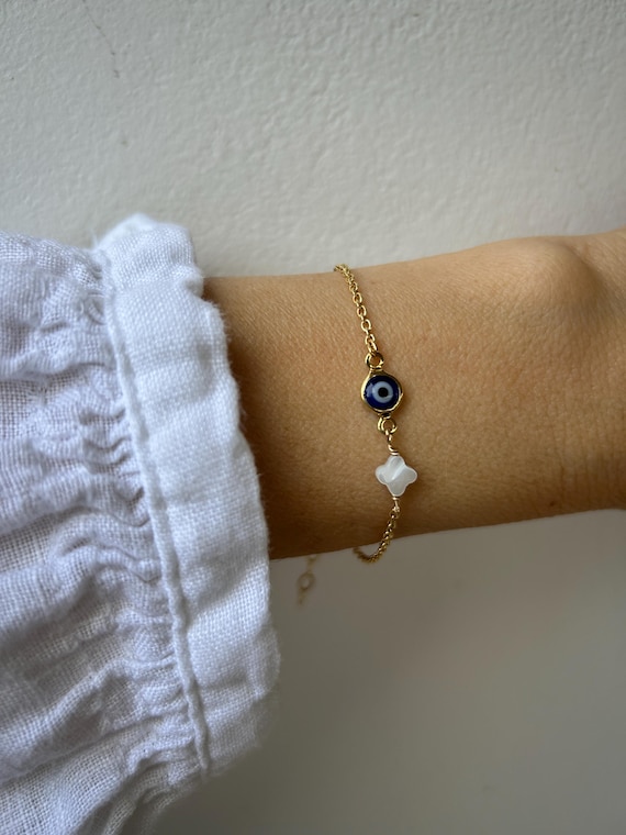 Evil eye bracelet with four leaf clover.  Good luck and protection bracelet. Mother of pearl four leaf clover bracelet.  Gold filled.
