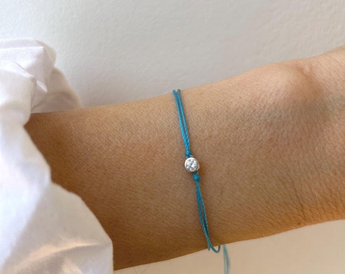 Solitaire cord bracelet. Sterling silver CZ charm.  Diamond friendship string bracelet.