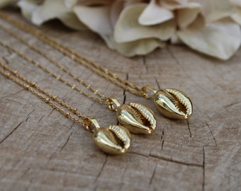 Gold cowrie shell necklace.Shell necklace. Gold dipped cowrie shell necklace. Layering necklace. 24K gold plated cowrie shell necklace.