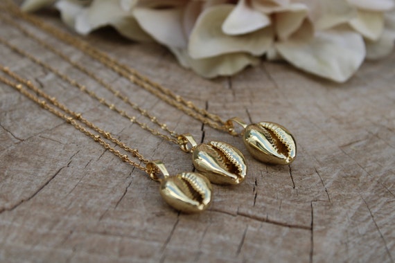 Gold cowrie shell necklace.Shell necklace. Gold dipped cowrie shell necklace. Layering necklace. 24K gold plated cowrie shell necklace.