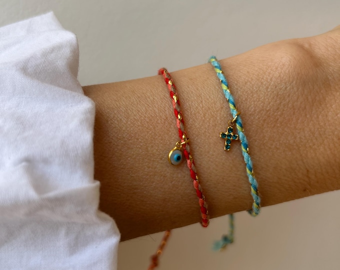 Boho cord bracelet. Evil eye, tiny cross charm.  Friendship string bracelet. Adjustable.