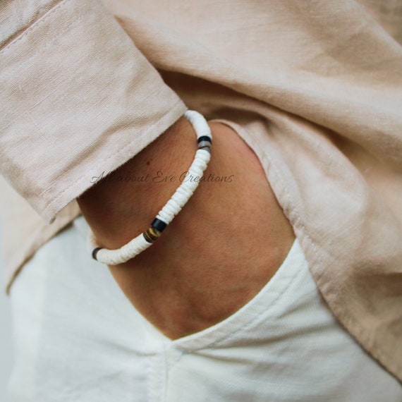 Surfer bracelet. White heishi puka shell bracelet. White litub shell beaded bracelet. Stretch bracelet. Waterproof bracelet.