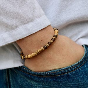 Mens coconut heishi and smoky quartz bracelet. Smoky quartz bracelet men. Mens surfer style bracelet. Stretch bracelet.