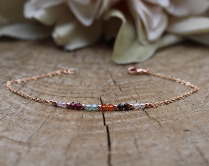 Bracelet for motivation.  Selenite, garnet, apatite, carnelian, tiger's eye, clear quartz. Gold filled/sterling silver/stainless steel