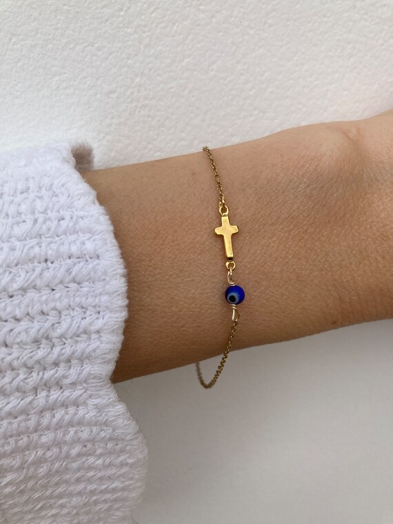 Sideways cross and evil eye bracelet. Evil eye bracelet.  Greek mati and cross bracelet. Protection. Gold, silver chain.