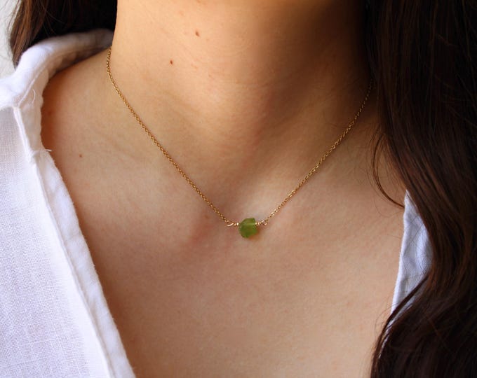 Peridot necklace. Peridot necklace. August birthstone. Green peridot.