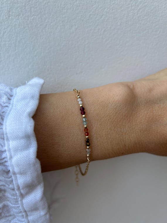 Bracelet for motivation.  Selenite, garnet, apatite, carnelian, tiger's eye, clear quartz. Gold filled/sterling silver