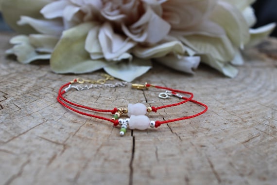 Jade Cord Bracelet. Red string bracelet with flower jade. Abundance, good luck and protection.