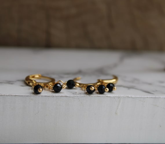 Black tourmaline huggie earrings.  24k Gold  plated brass hoop earrings. October birthstone. Empath protection.