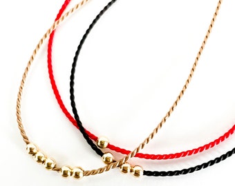 14K Gold Red Silk Cord Bracelet: Minimalist Friendship Jewelry