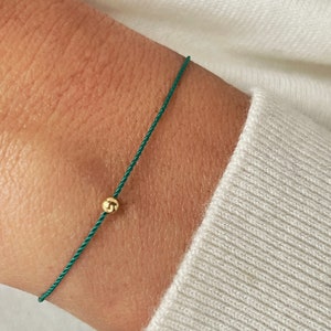 14k Gold silk string bracelet, solid gold emerald green silk string Bracelet, string of fate, friendship bracelet - evil eye bracelet