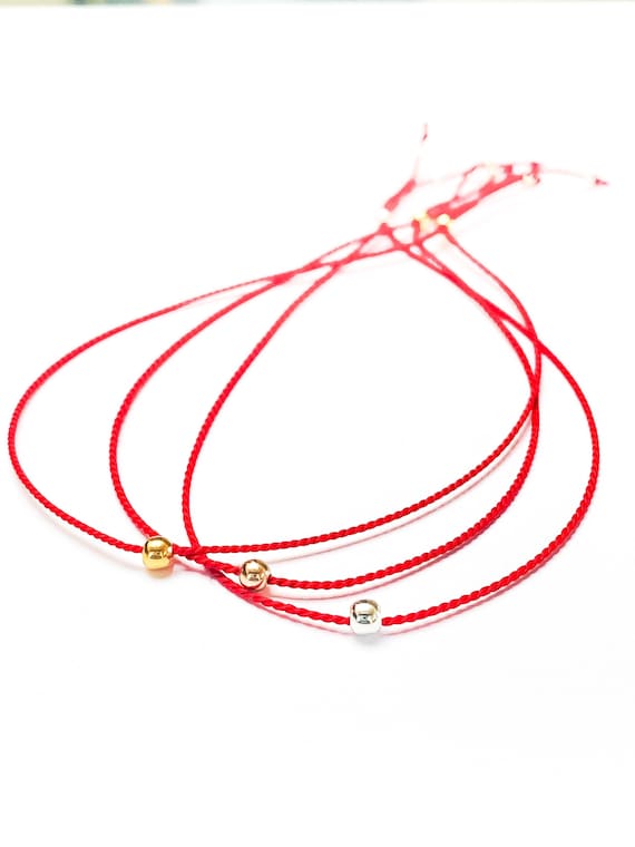 Lucky red deals line bracelet
