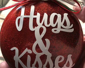 Hugs and Kisses glittered glass Christmas ornament