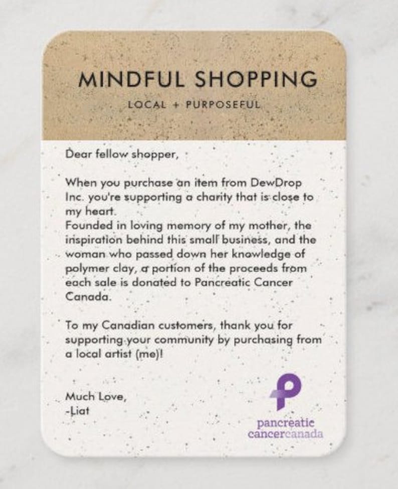 May include: A handwritten note on a beige background with brown speckles. The note reads "Mindful Shopping, Local + Purposeful". The note also includes a message about supporting a charity that is close to the writer's heart. The note is signed "Much Love, -Liat" and includes a purple ribbon logo for Pancreatic Cancer Canada.