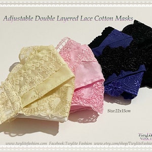 May include: Four double-layered cotton face masks with adjustable ear loops. The masks are made of white cotton with delicate lace trim in yellow, pink, blue, and black.