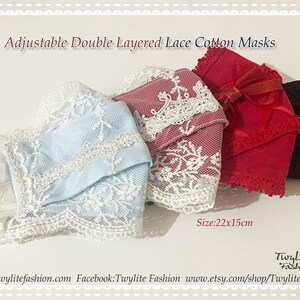 May include: Three double-layered cotton face masks with lace trim. The masks are in blue, red, and black. The masks are 22 inches by 15 inches.