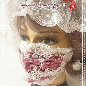 May include: A white lace face mask with a red cotton lining. The mask is double layered and adjustable. The text "Adjustable Double Layered Lace Cotton Masks" is visible in the image.