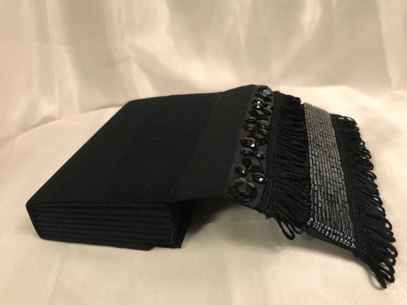 black fringe clutch