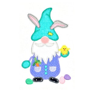 May include: An embroidered design of a blue and purple gnome with a blue hat and bunny ears, holding a yellow chick. The gnome is surrounded by green and purple Easter eggs.