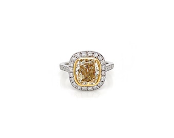 4.31 Total Carat Fancy Yellow Diamond Ladies Halo Pave-Set Engagement Ring. GIA Certified.