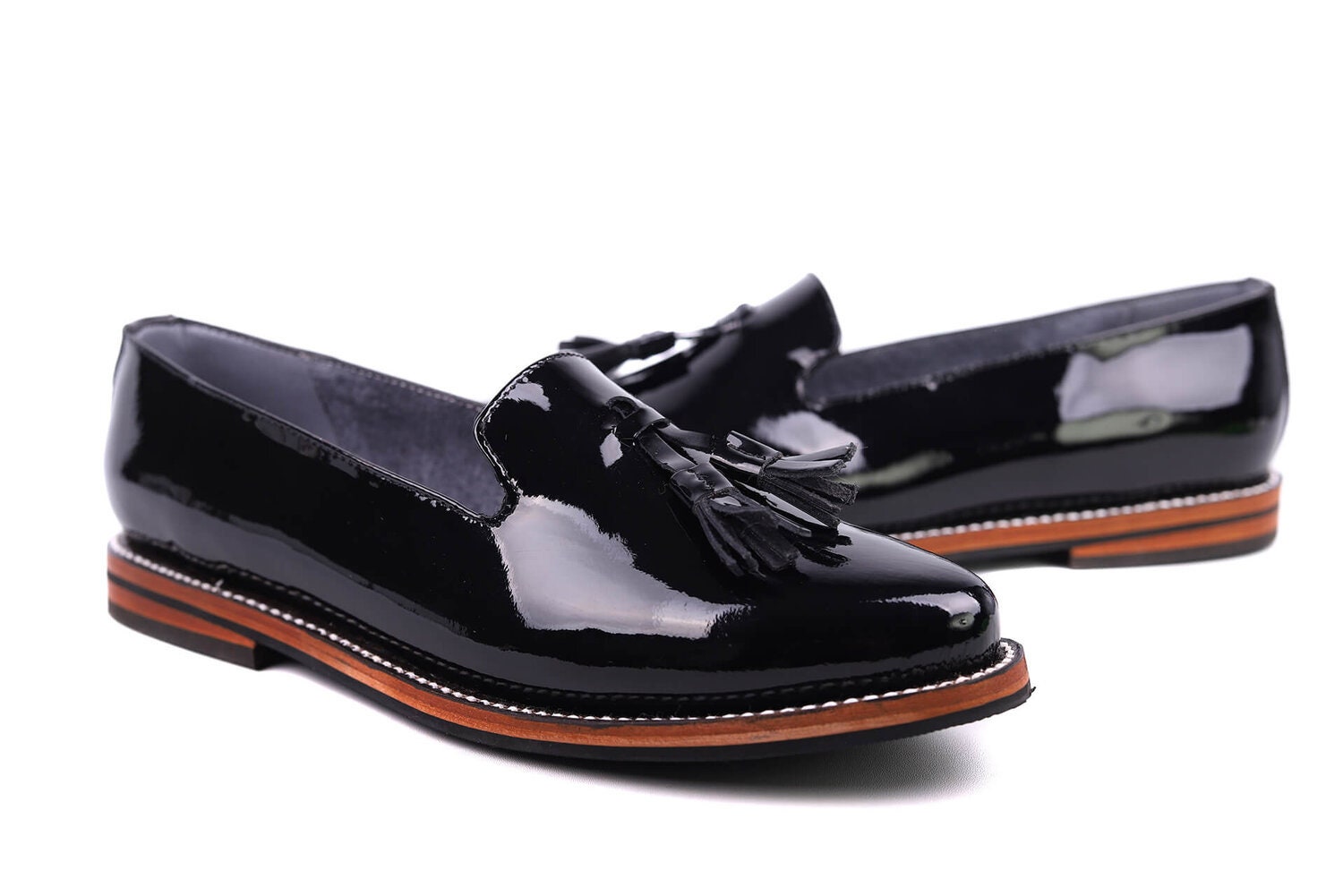 Patent leather loafers store with tassels