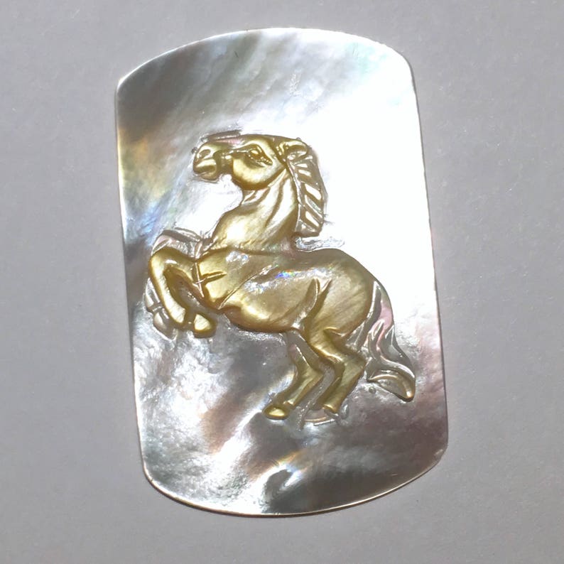 Item:ABL17007 Australia Rare 3.4g Hand Carved Chatoyant Mother of Pearl Horse Abalone Shell Carving
