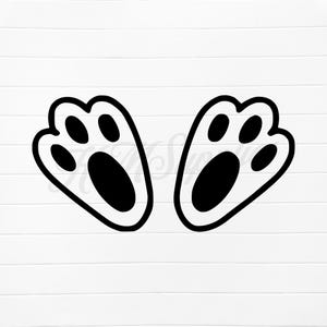 Puede incluir: Dos huellas de patas de conejo negras sobre un fondo blanco.