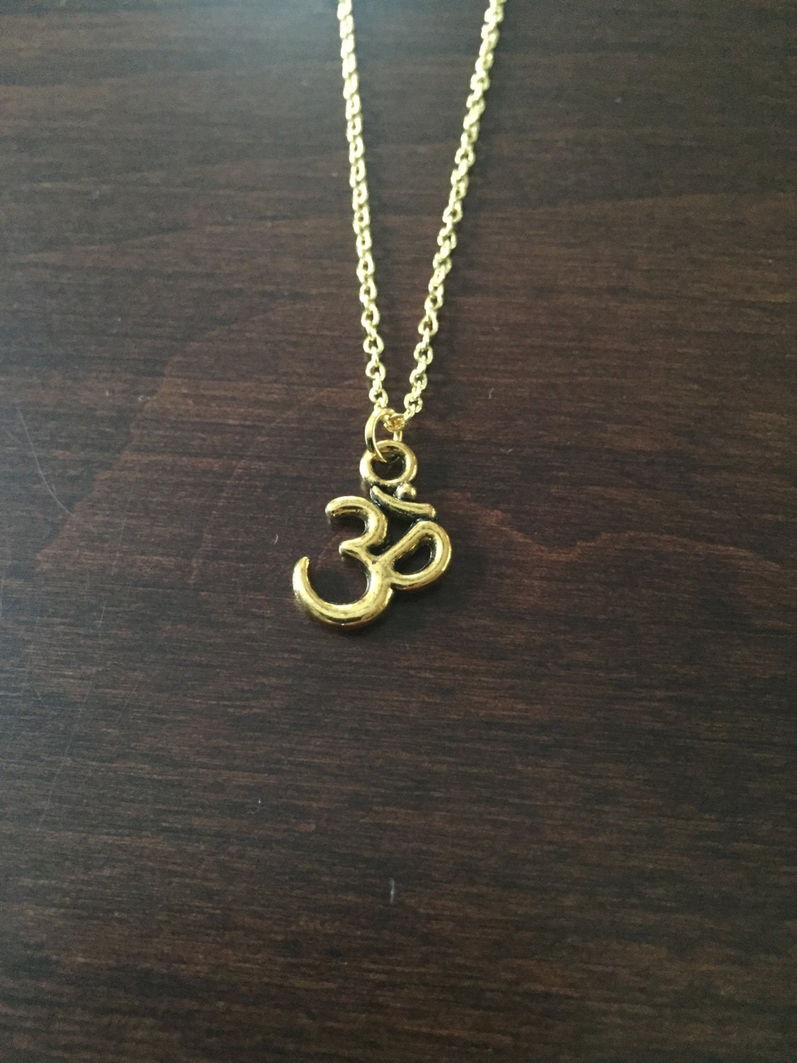 Om pendant shop necklace