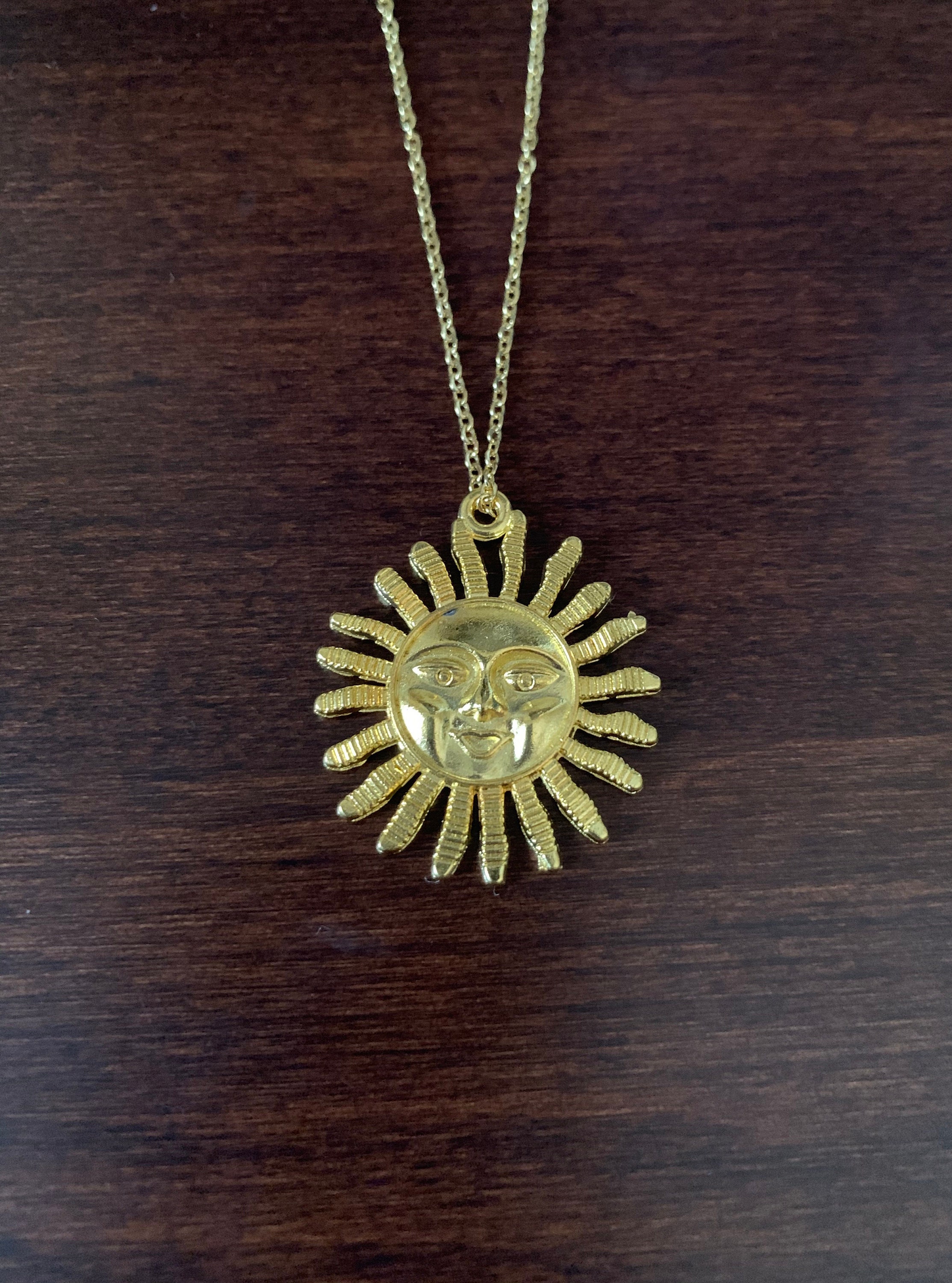 gold sun necklace with face, gold sun necklace, sun face necklace, big sun necklace, sun necklace gold, gold sun pendant, sun pendant gold