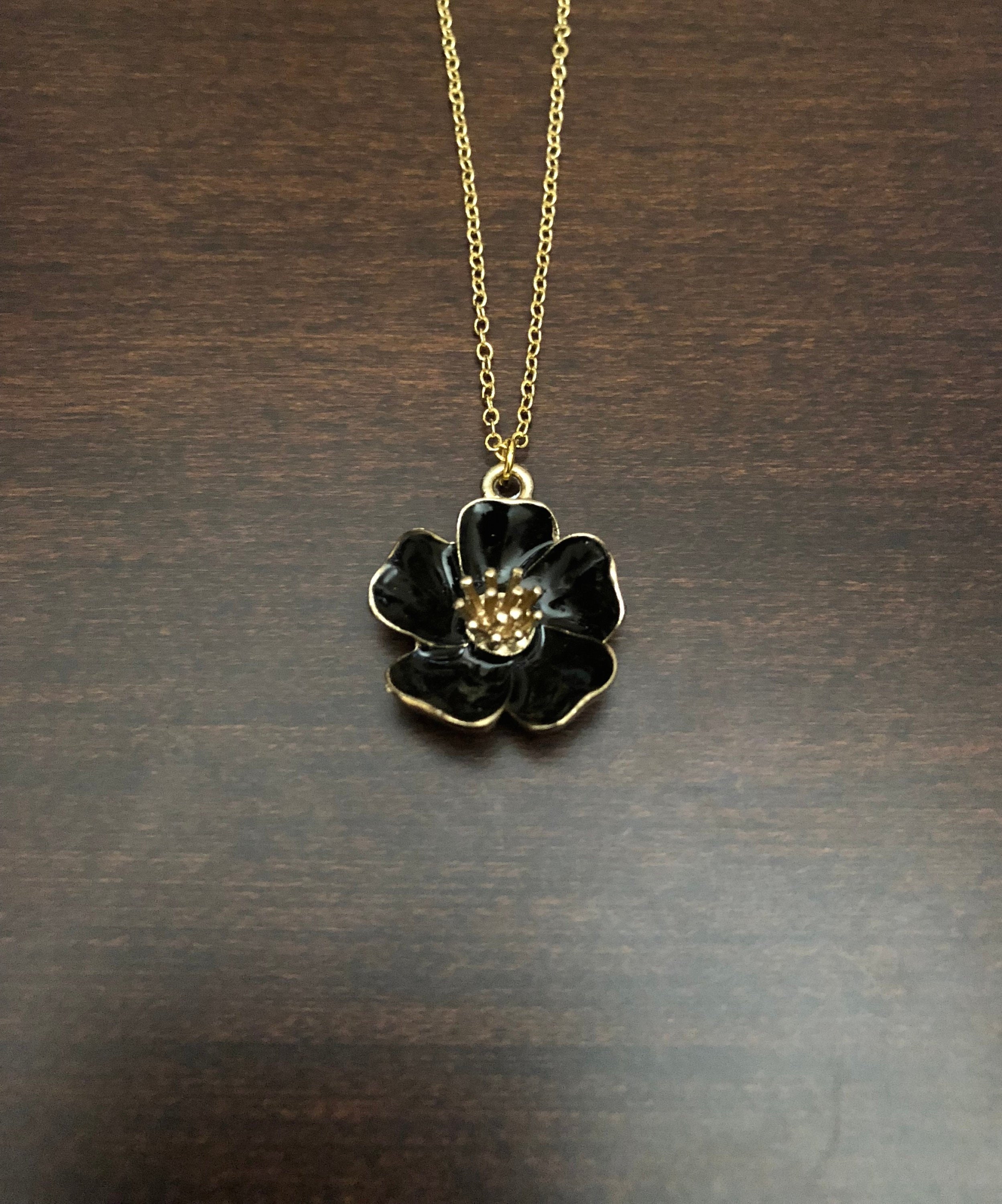 Black flower jewellery discount