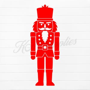 May include: A red nutcracker soldier silhouette. The design features a tall hat, a white mustache and beard, and a uniform with a belt and boots. The image is a festive holiday decoration.