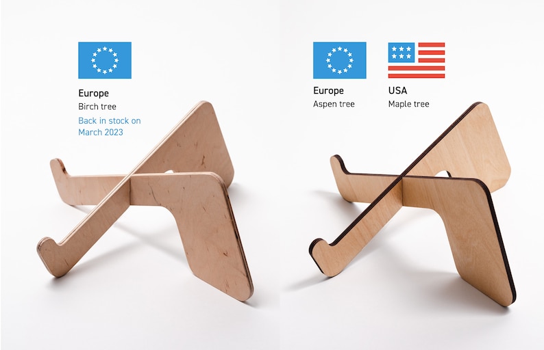 May include: Two wooden laptop stands, one made from birch and one from maple. The birch stand is labeled "Europe" and the maple stand is labeled "USA".