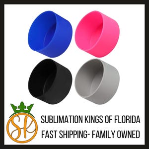 May include: Four silicone cup holders in blue, pink, black, and gray. The holders are designed to fit around a standard-sized cup or bottle.