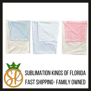 May include: Three plush blankets with a white backing and a soft, textured front. The blankets are in blue, white, and pink.