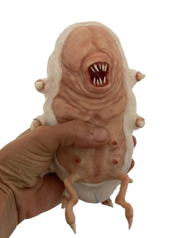 Baby Creatures Official Mascot: Larva Genesis” /hyper-realistic