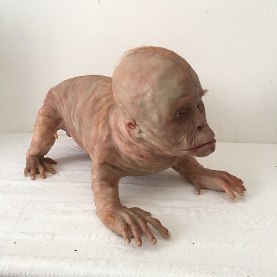 Hand-carved Dog Man Sculpture | Unique Anthropomorphic Silicone