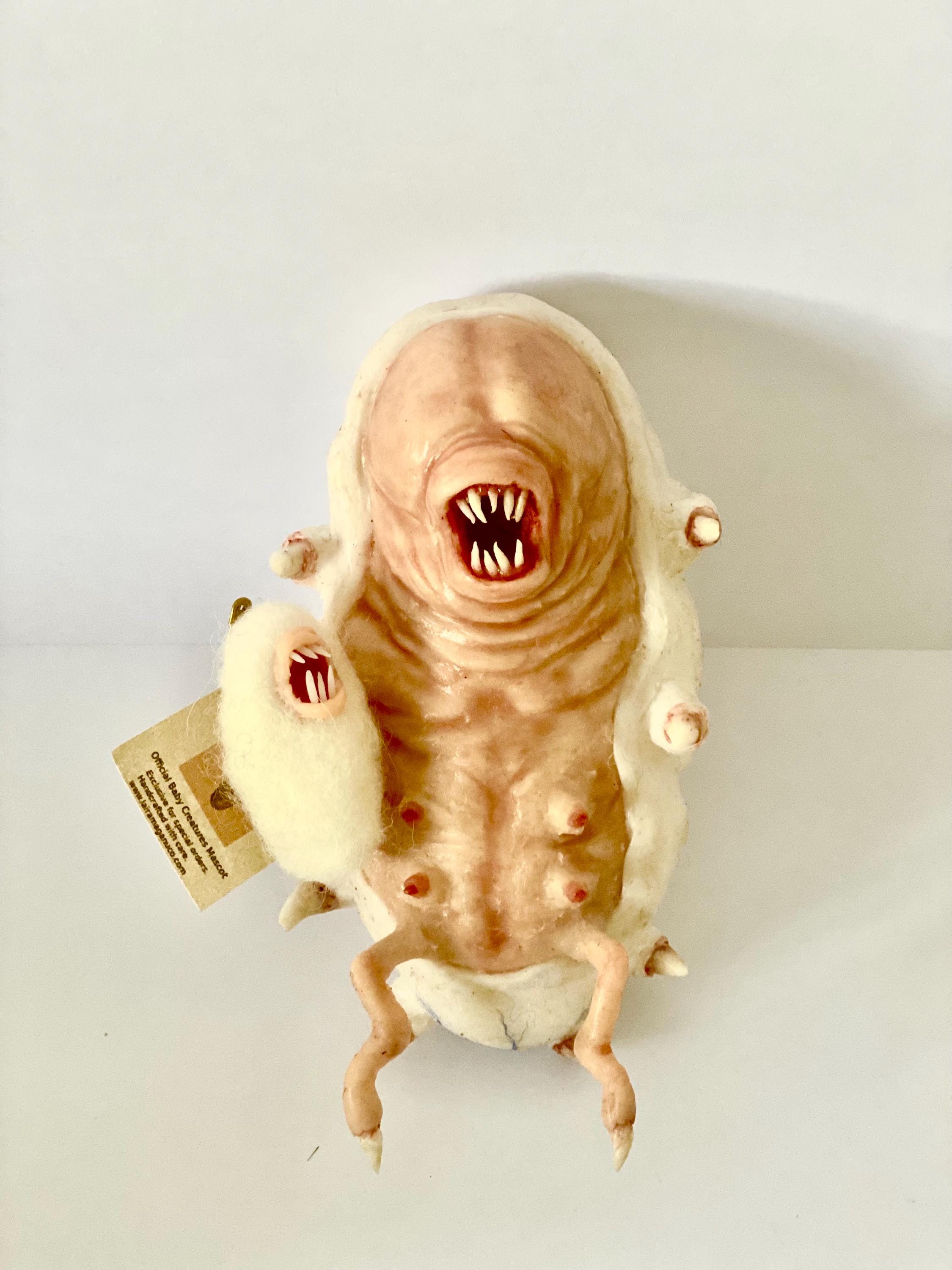 Creature baby’s Baby Creatures Official Mascot: Larva Genesis” /hyper-realistic
