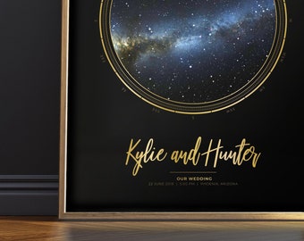 May include: A black and gold star map print with the names "Kylie and Hunter" and the text "Our Wedding 22 June 2018 5:00 PM | Phoenix, Arizona".