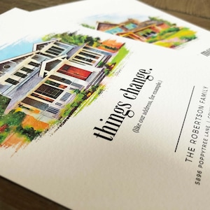 May include: A watercolor illustration of a house with the text "things change. (like our address, for example.)" and "THE ROBERTSON FAMILY 5896 POPPYTREE LANE | COLUMBUS, OHIO 43085 moved."
