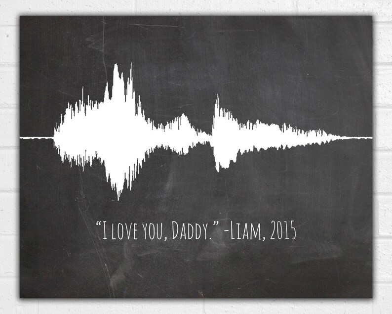May include: A black and white image of a sound wave on a chalkboard background. The text "I love you, Daddy" - Liam, 2015 is written below the sound wave.